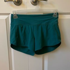 Brand new with the tags lululemon size 4 tall speed ups in aquatic green